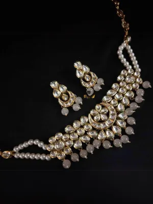 Kundan Stone Studded And Pearl Handcrafted Jewellery Set